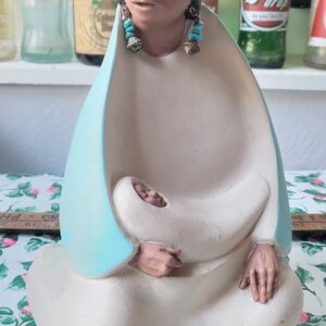 Handcrafted Ceramic Figurine with Baby